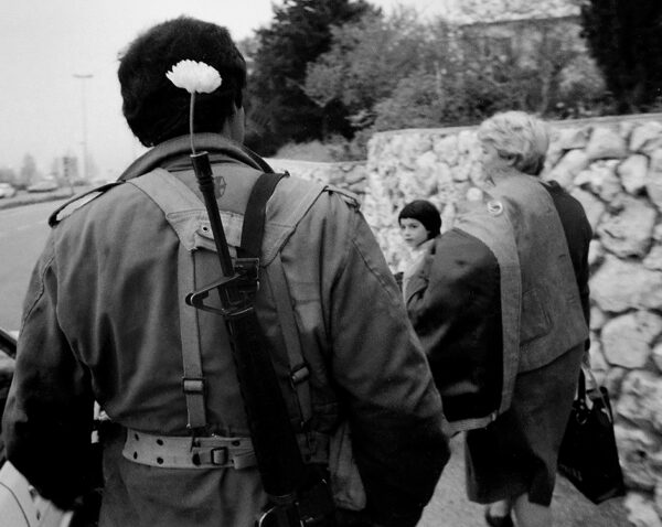 PV Skirball Faces of Israel 02 1985 haifa soldier shabbat flower bw